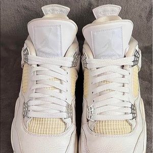 "Nike Air Jordan Retro 4. Triple white.